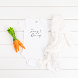 White onesie button close with Snuggle Bunny graphic on shirt