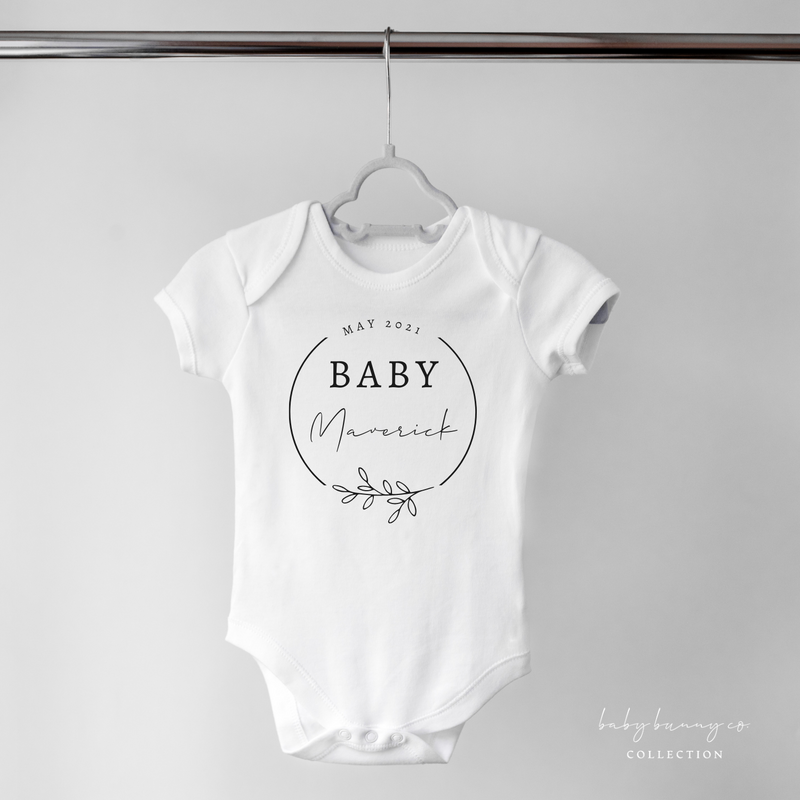 Custom baby onesie birth announcement in white