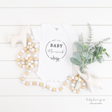 Custom baby onesie birth announcement in white