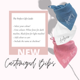 Cotton bib with button closure in blue, white and pink with option to customized name.