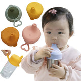 Kids' silicone leak proof lid in various colours.