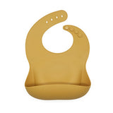Reusable silicone bib in mustard yellow.
