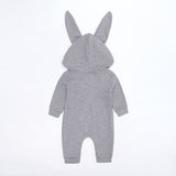 Grey long sleeve, zip up jumpsuit with bunny ears hood.