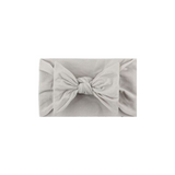 Soft fit headband with bow in gray.