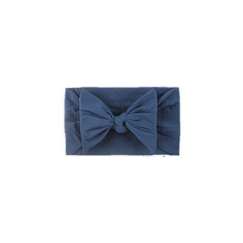 Soft fit headband with bow in navy.