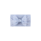 Soft fit headband with bow in light blue.