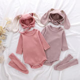 3 piece baby set with bunny ears hat, long sleeve onesie and knee high socks in rose and mauve.