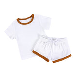 2 piece cotton tee shirt and shorts set in white with mustard yellow trim.
