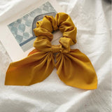 Handmade bunny ears scrunchie in mustard.