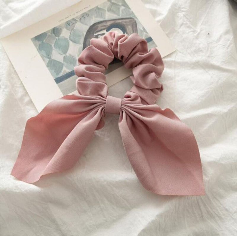 Handmade bunny ears scrunchie in pink.