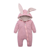 Pink long sleeve, zip up jumpsuit with bunny ears hood.